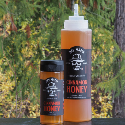 Combination pack of Cinnamon Honey a smaller 350 gram bottle and a larger 40 fluid ounces chef squeeze bottle.